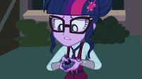 Twilight holding her amulet with unease EG3