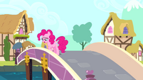 Pinkie Pie stepping onto a bridge S4E12