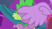 Twilight covers Spike with her left wing S06E08