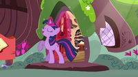 Twilight smiling with her hoof raised S3E13