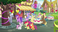 Apple Bloom talks to her friends at the cafe S8E10