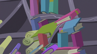 Books and scrolls pulled toward the black hole S7E1