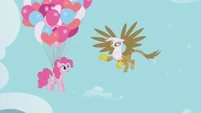 Gilda talking to Pinkie Pie.