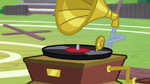 Record player playing upbeat music S9E15