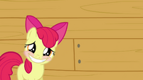 Apple Bloom putting on a big smile.