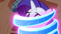 Twilight casting a very difficult spell on Rarity to give her wings