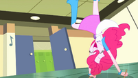 Pinkie Pie cartwheeling toward the door SS10