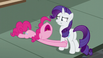 Pinkie Pie holding Rarity's legs while asking for help S6E3