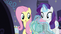 Rarity levitating an outfit for Fluttershy S8E4