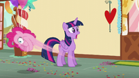 Twilight in shock while Pinkie bounces around the room S5E19