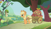 Applejack pulling a cart filled with apples S1E10