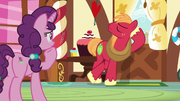 Big Mac leans against the bakery door S8E10