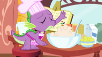 Spike letting go of gems onto cake S3E11