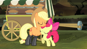 Applejack and Apple Bloom hugging S4E17