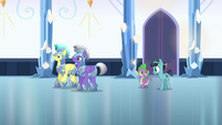 Spike and Crystal Hoof walk behind royal guards S6E16