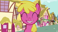 Seeing Pinkie pass by, makes her smile. :)