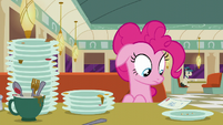 Pinkie Pie looking at the check S6E9