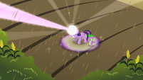 Twilight using her magic in the rain.