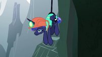Luna hangs bored from climbing rope S9E13
