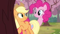 Applejack is not freaking out at Pinkie's sudden long neck.