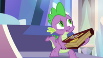 Poor Spike, having to carry that heavy book all by himself.