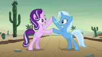 Starlight and Trixie touching hooves S8E19