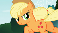 Applejack looking back at the timberwolves S3E9