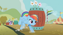 Rainbow Dash with freckles and the same expression that Applejack had when she did the barrel run; also, her wings are on her neck.