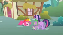 Spike's sort've scared of Pinkie's demeanor.