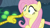 Discord pointing his claw in Fluttershy's face S6E26