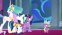 Twilight, Celestia, and Shining look behind them S9E4