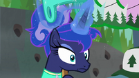 Luna removes her zip-lining helmet S9E13