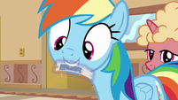 Rainbow Dash taking a rollercoaster ticket S8E5