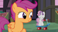 Sweetie Belle walks toward Scootaloo's scooter S8E12