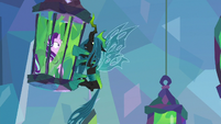 Chrysalis hangs from Starlight's cage S9E25