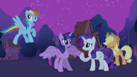 Rarity checking out Twilight's wings.