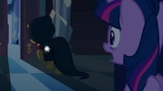 Twilight sees Sunset Shimmer in cloak 1EG