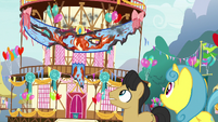 Ponies look at the smoldering banner S7E15