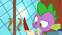 Spike is writing a letter to Celestia.