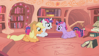 Twilight sitting with smiling Rarity and Applejack S1E8