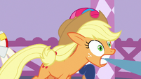 Applejack gets pulled along with Starstreak's fabric S7E9
