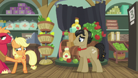 Applejack pushing Big Mac out of Rich's store S6E23