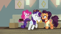 Rarity crosses in front of Coriander and Saffron S6E12
