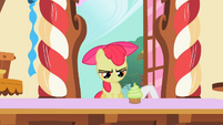 Sweetie Belle pushing cupcake to Apple Bloom S2E06
