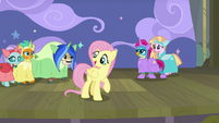 Young Six appear behind Fluttershy in costumes S8E7