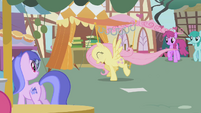 Fluttershy's so scared, she's flying away and crying.