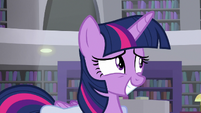 Twilight grinning with embarrassment S9E5