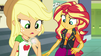 Applejack and Sunset notice their geodes glowing EGDS5