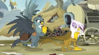 Gilda sealing an envelope next to Gabby S6E19.png (1.06 MB)