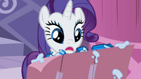 Rarity looking at Sweetie Belle's drawing S2E05